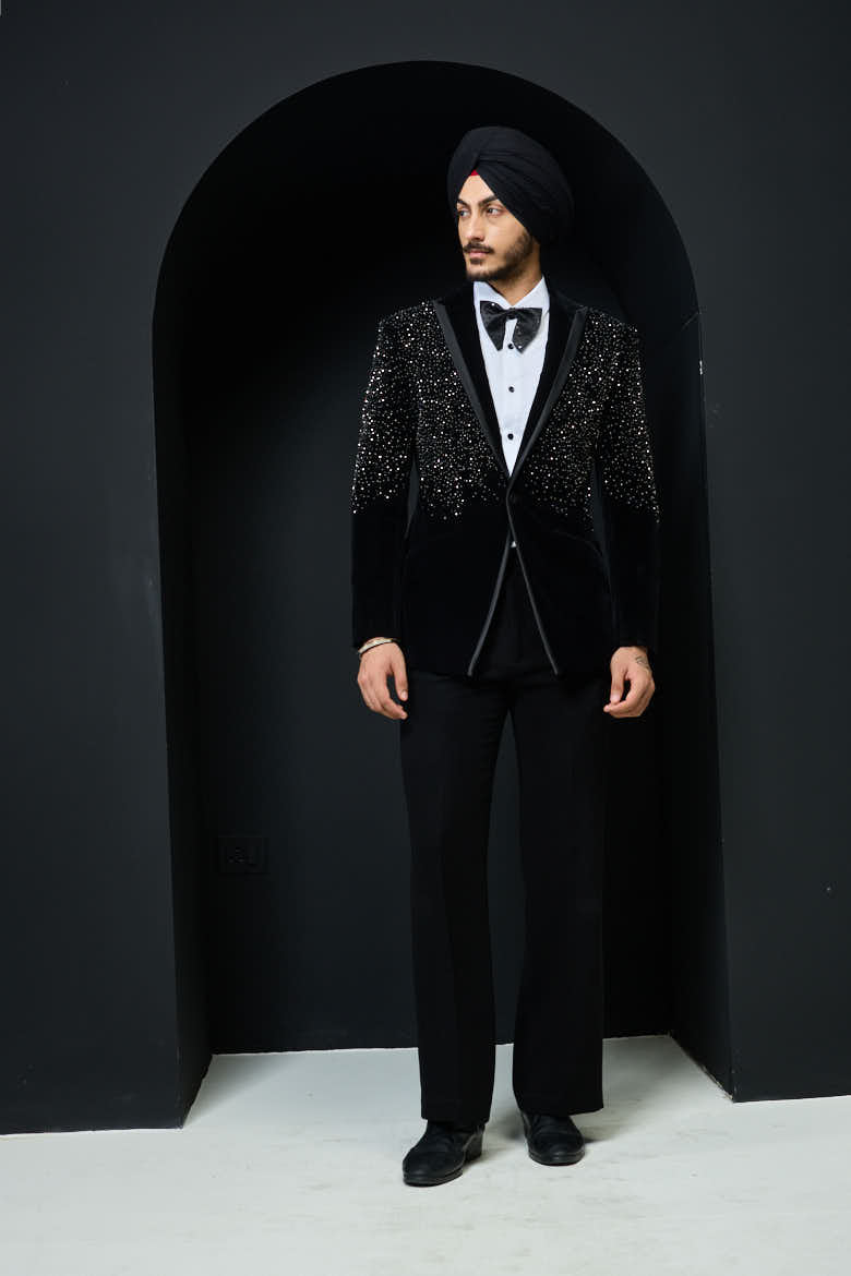Black tuxedo highlighted with pearls and crystal