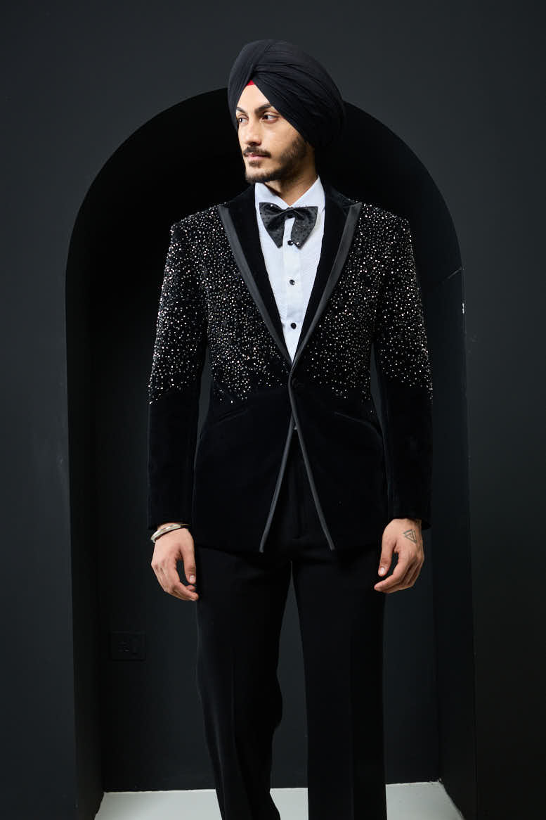 Black tuxedo highlighted with pearls and crystal