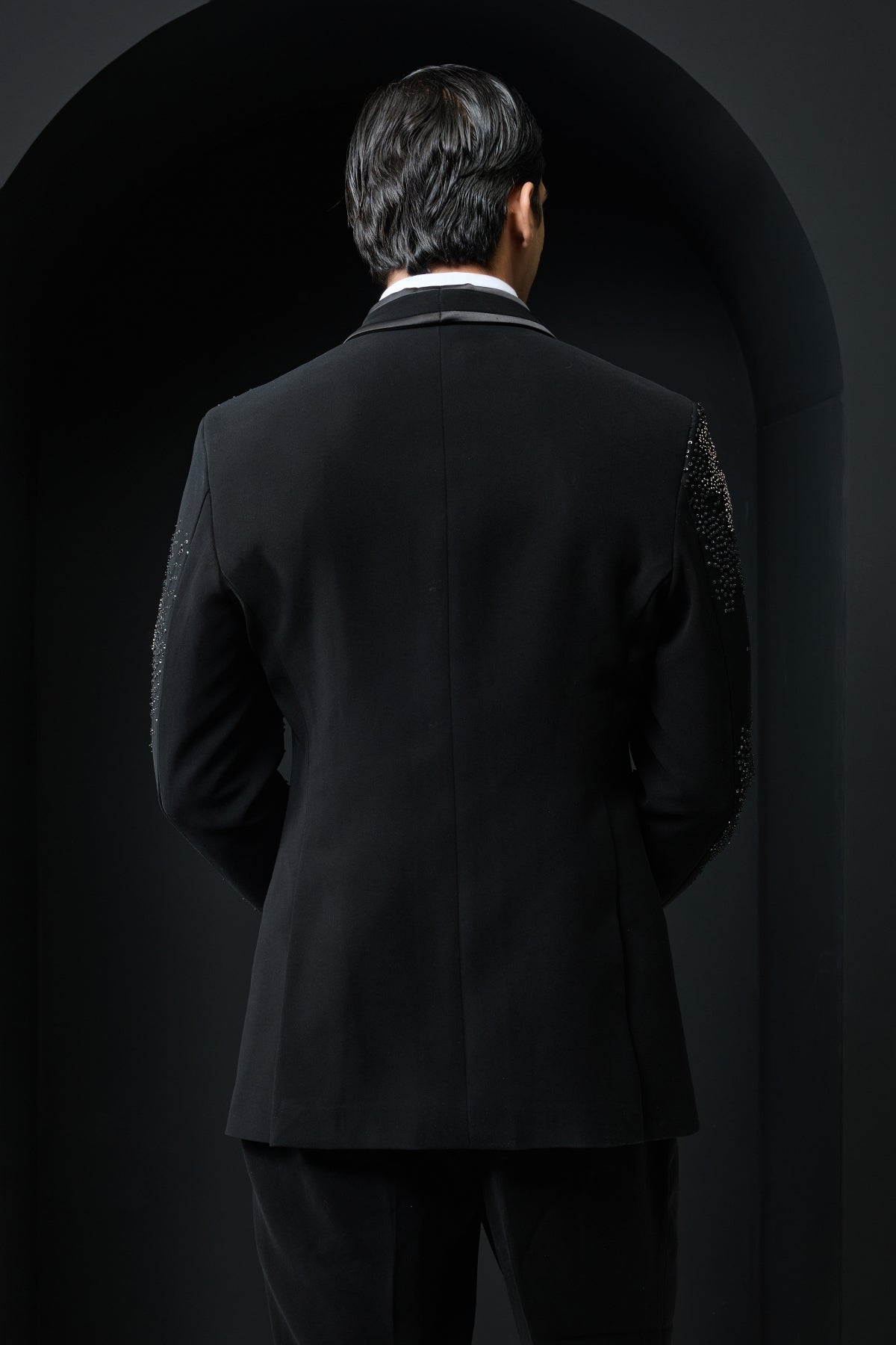 Black tuxedo highlighted with sequins, pearls,cutdana