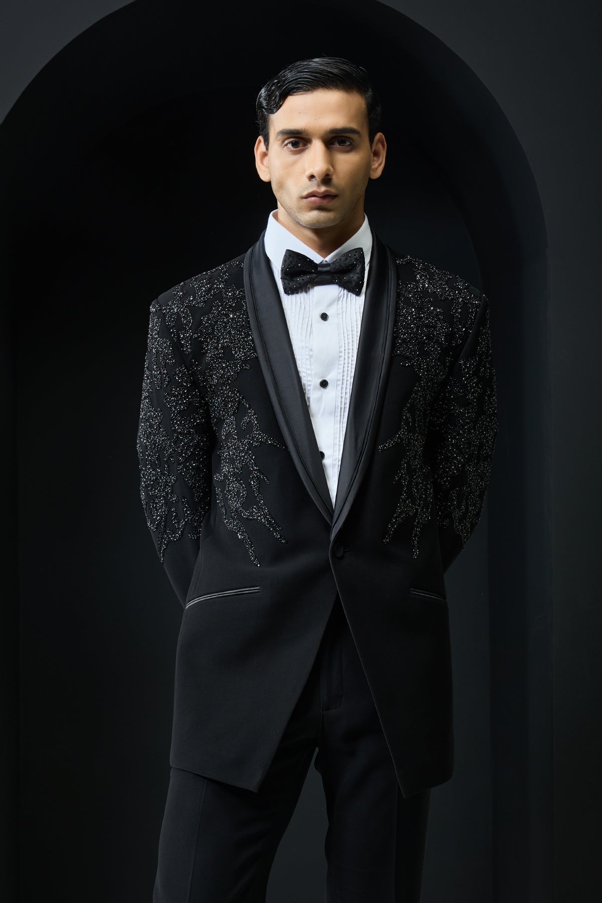 Black tuxedo highlighted with sequins, pearls,cutdana
