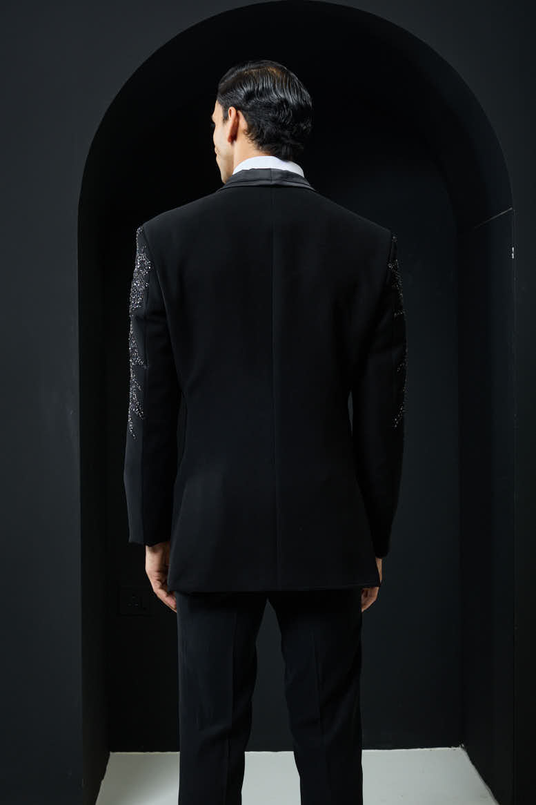 Black tuxedo highlighted with sequins, pearls,cutdana
