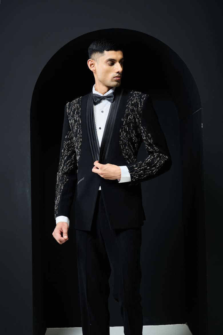 Black tuxedo highlighted with pearls and cutdana