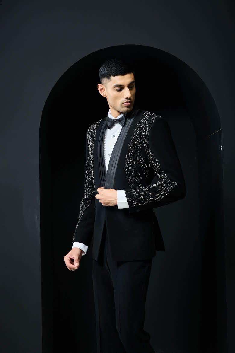 Black tuxedo highlighted with pearls and cutdana