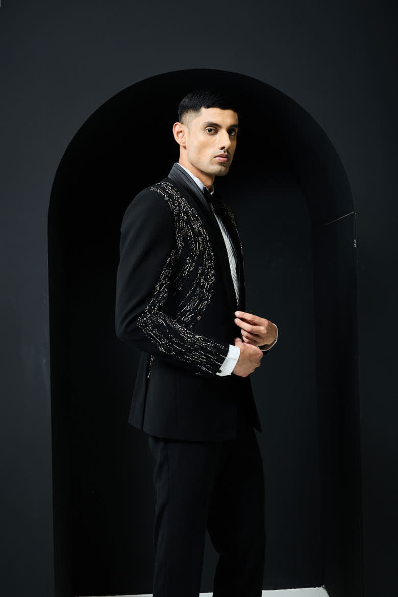 Black tuxedo highlighted with pearls and cutdana