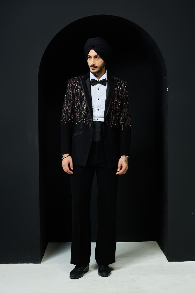 Black tuxedo highlighted with pearls, sequins and thread work