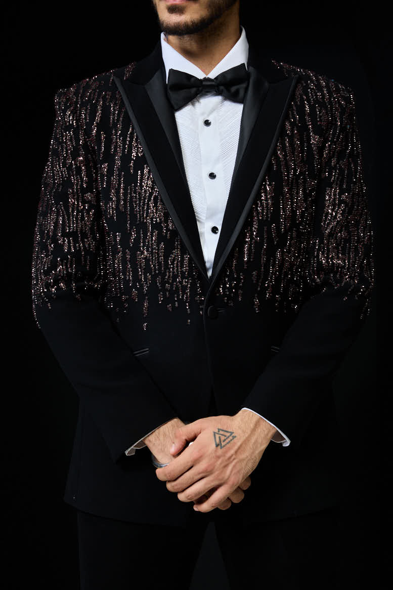 Black tuxedo highlighted with pearls, sequins and thread work