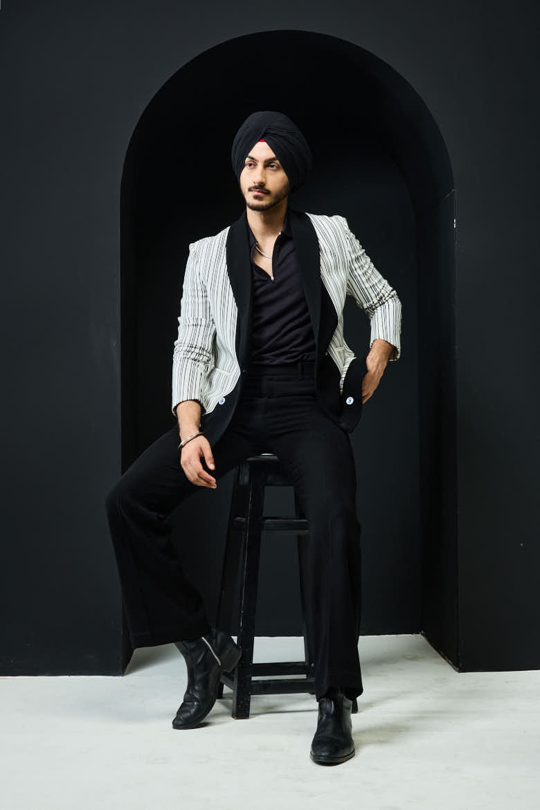 White and black strip jacket detailing with white button