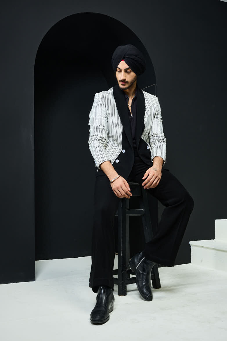 White and black strip jacket detailing with white button