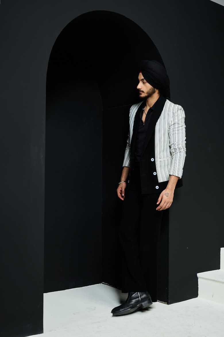 White and black strip jacket detailing with white button