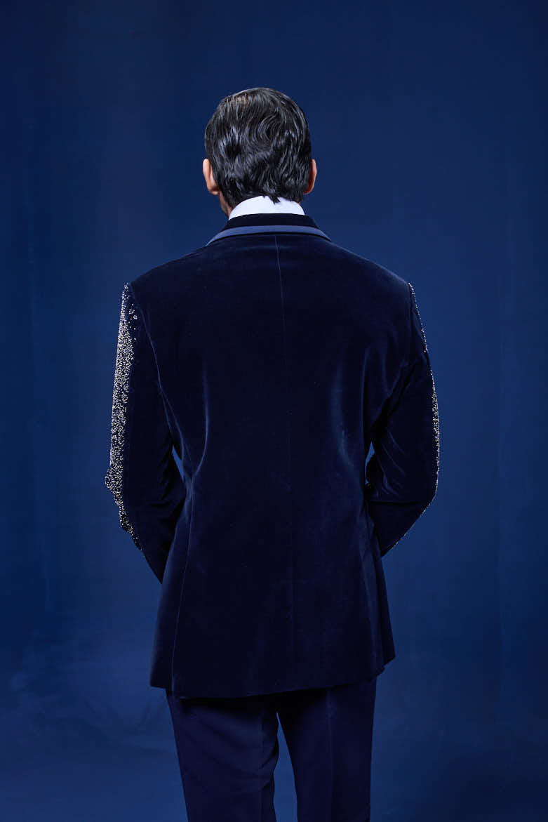 Navy Blue tuxedo highlighted with pearls and sequins