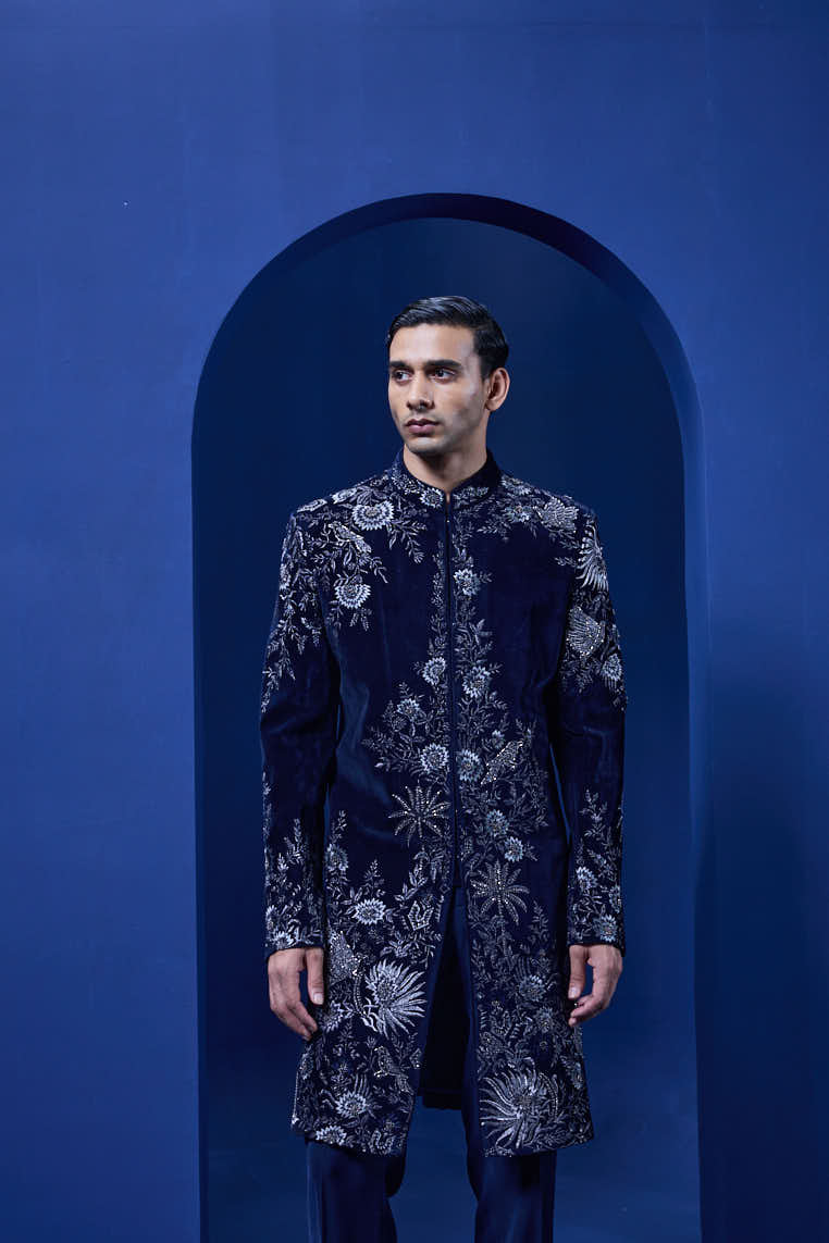 Navy blue Indo Western highlighted with silver zari, pearl and cutdana