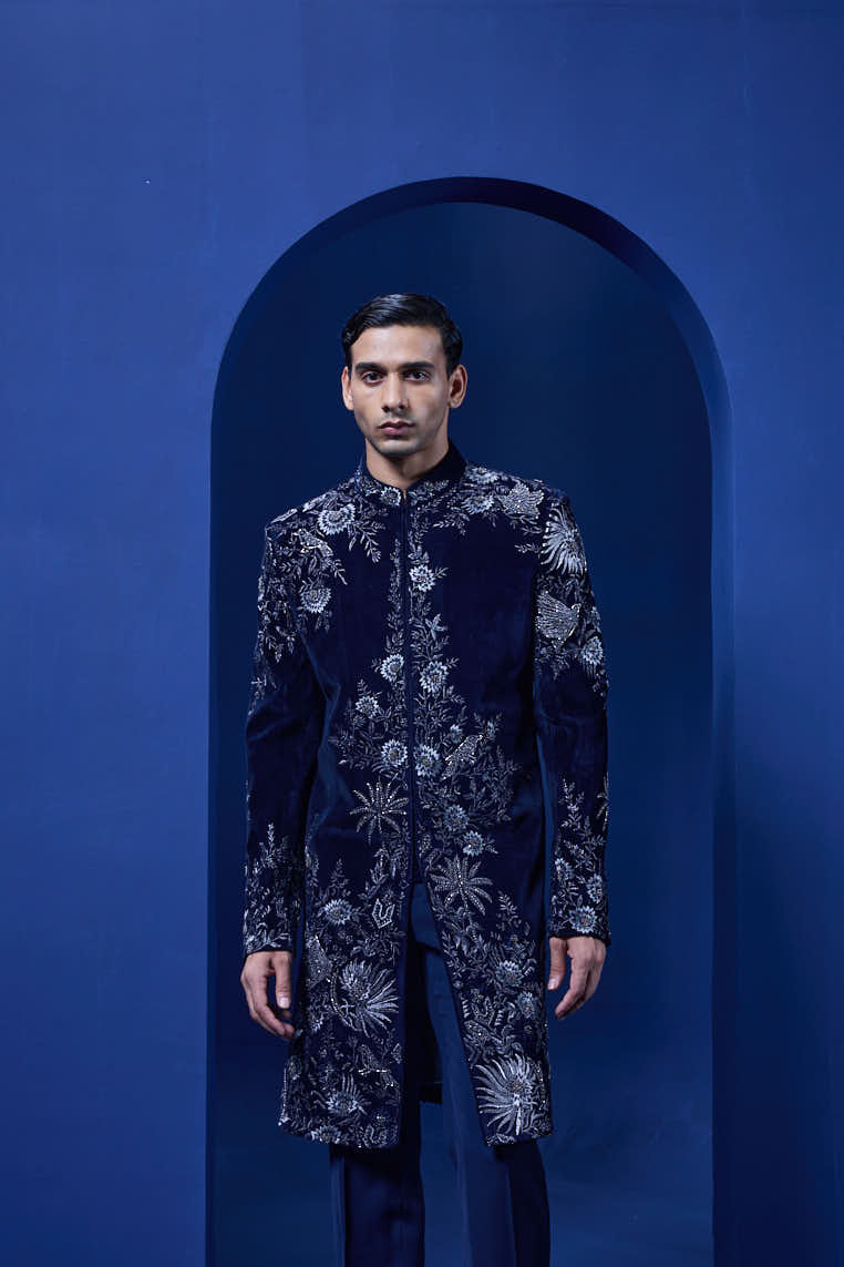 Navy blue Indo Western highlighted with silver zari, pearl and cutdana