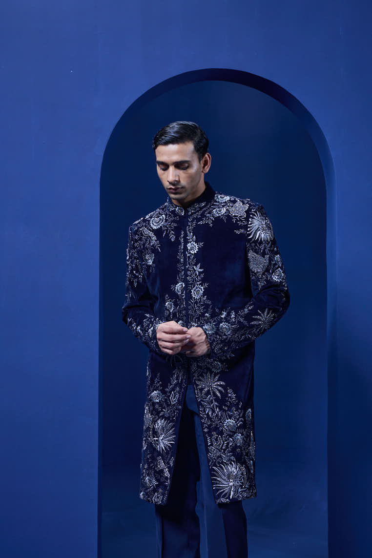 Navy blue Indo Western highlighted with silver zari, pearl and cutdana