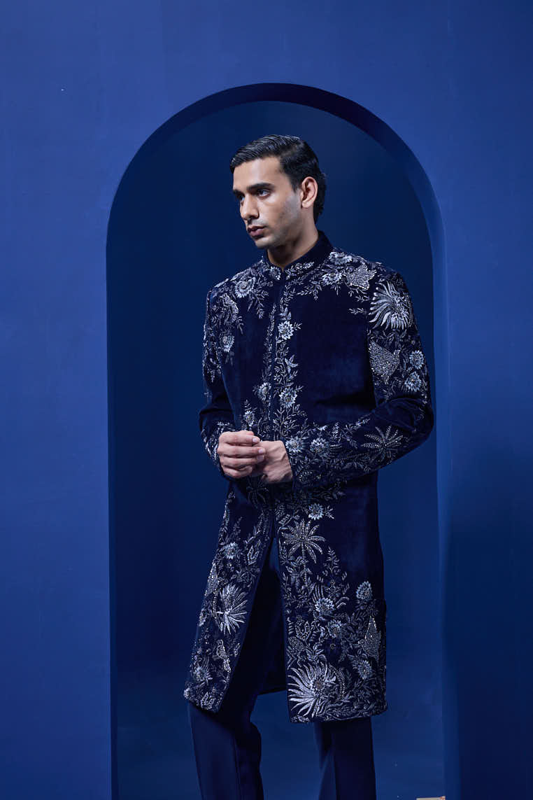 Navy blue Indo Western highlighted with silver zari, pearl and cutdana