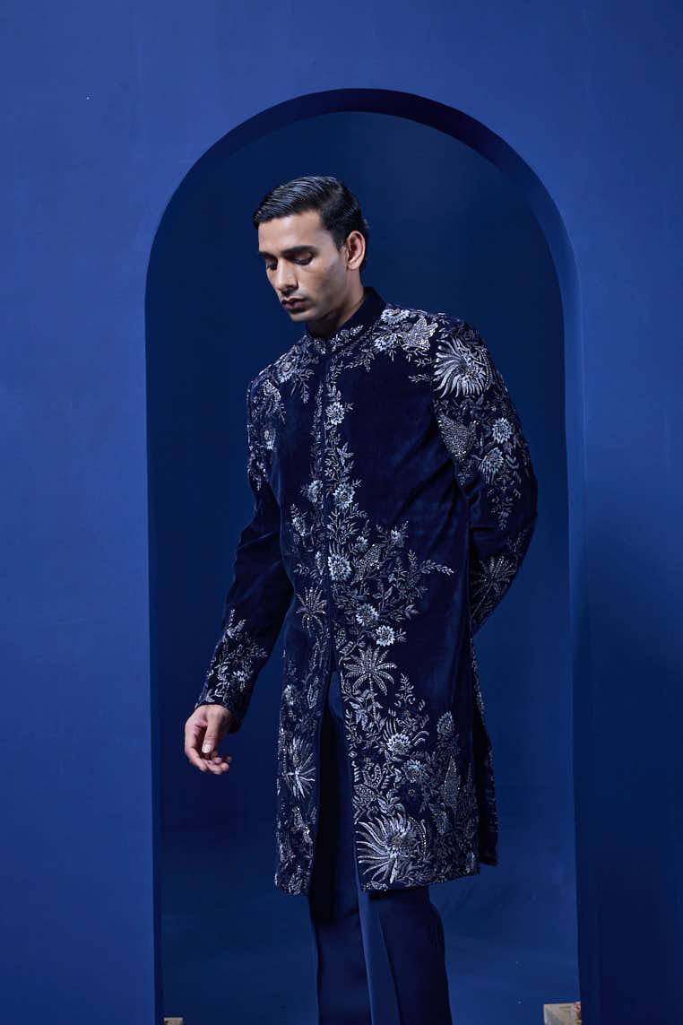 Navy blue Indo Western highlighted with silver zari, pearl and cutdana