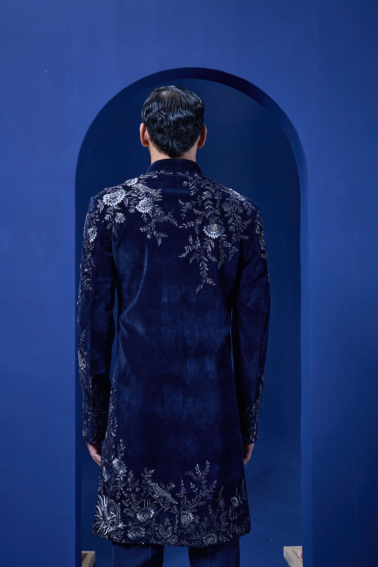Navy blue Indo Western highlighted with silver zari, pearl and cutdana