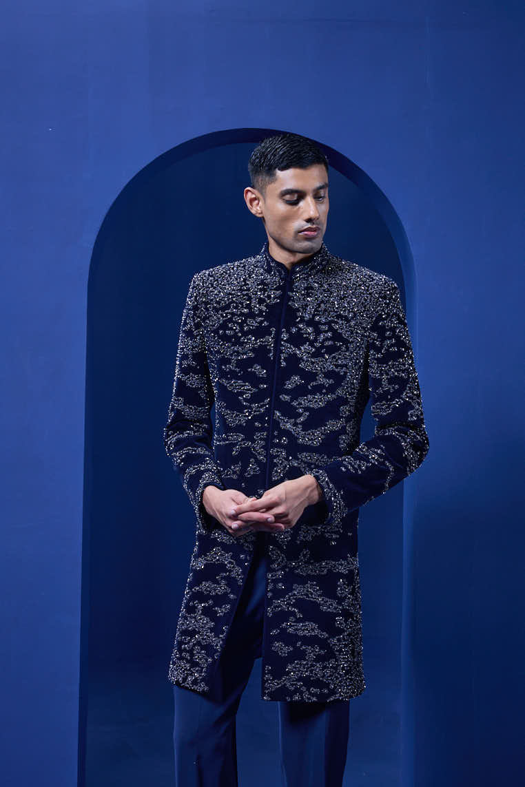 Navy blue Indo Western highlighted with silver zari, sequins,pearl and cutdana