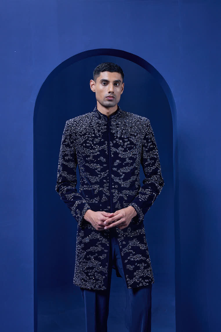 Navy blue Indo Western highlighted with silver zari, sequins,pearl and cutdana