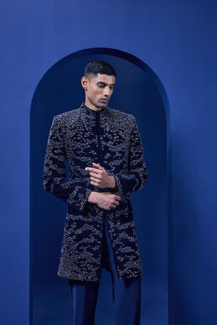 Navy blue Indo Western highlighted with silver zari, sequins,pearl and cutdana