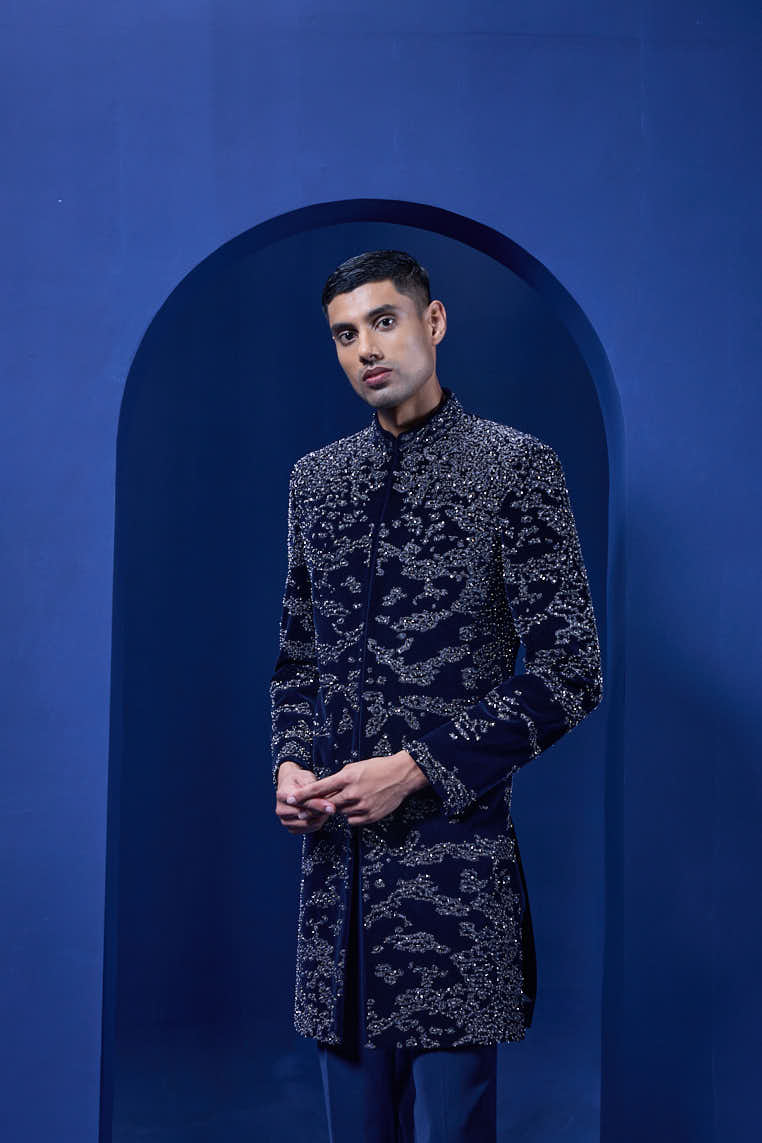 Navy blue Indo Western highlighted with silver zari, sequins,pearl and cutdana