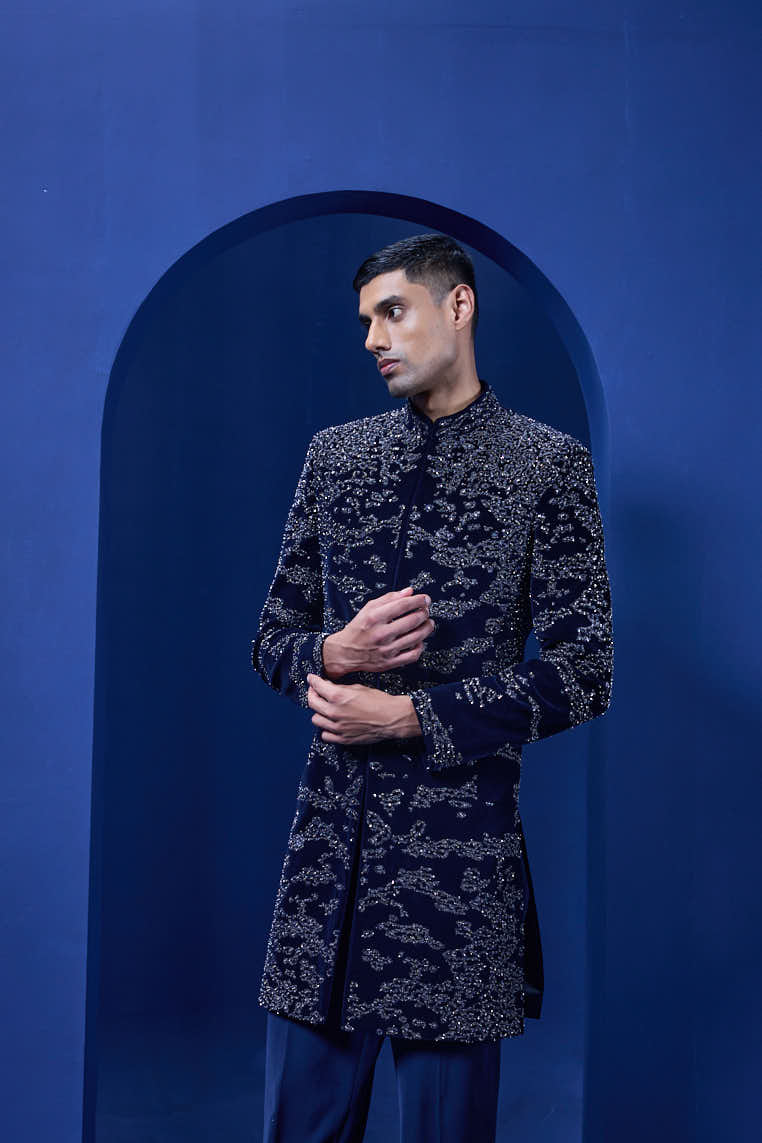 Navy blue Indo Western highlighted with silver zari, sequins,pearl and cutdana