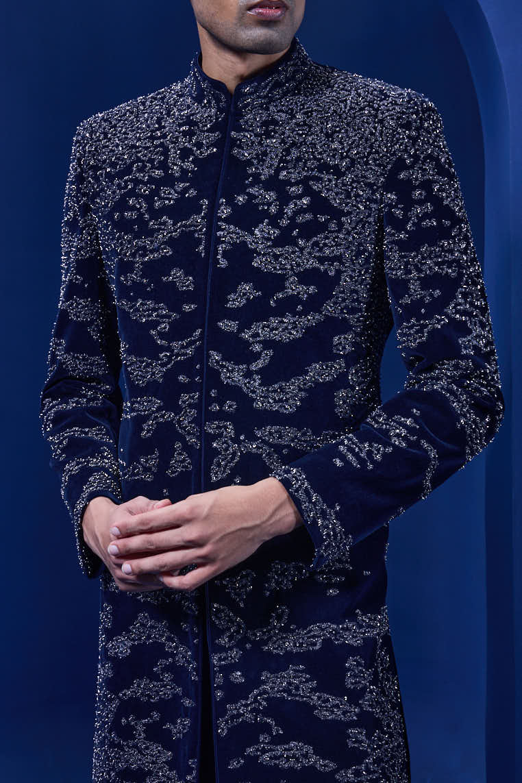 Navy blue Indo Western highlighted with silver zari, sequins,pearl and cutdana