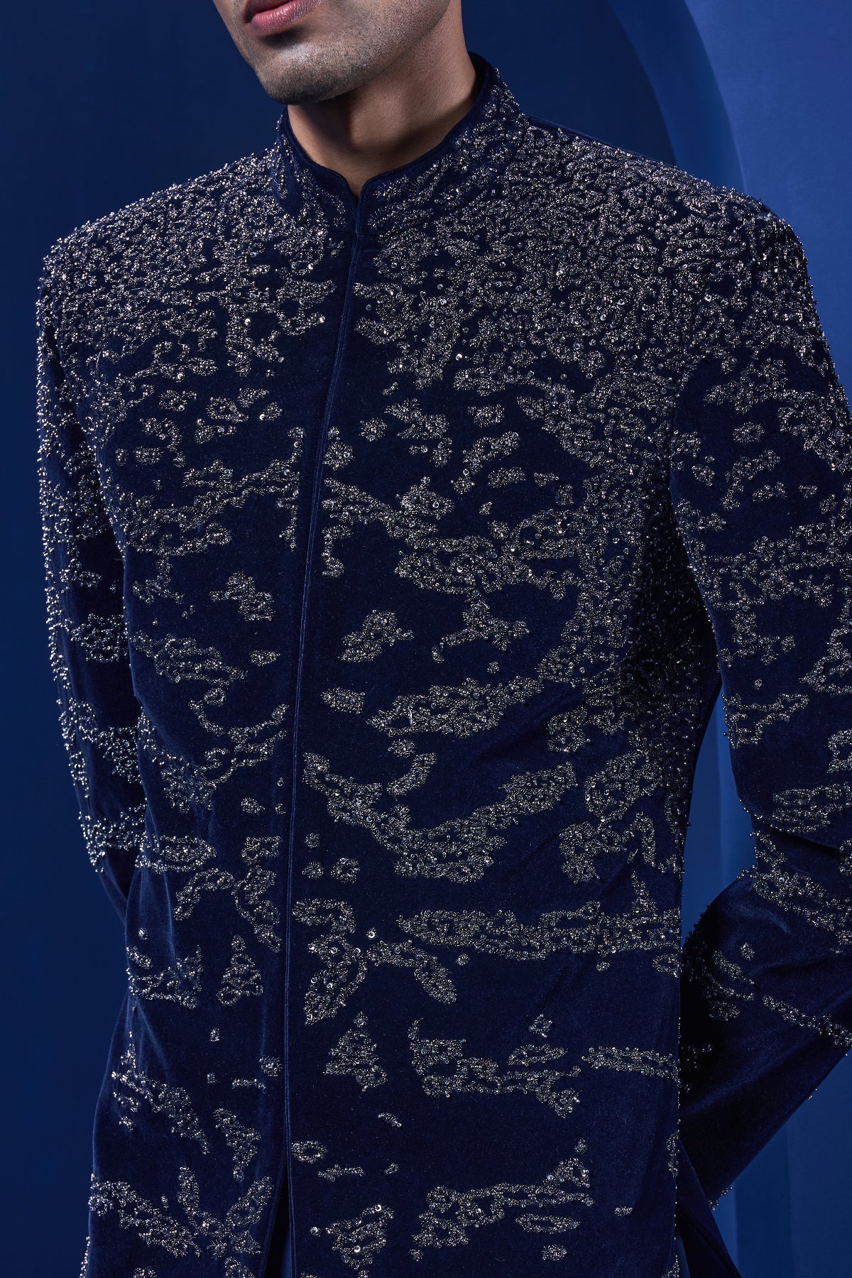 Navy blue Indo Western highlighted with silver zari, sequins,pearl and cutdana