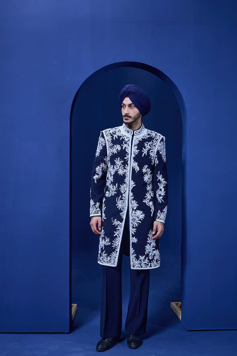 Navy blue Indo Western highlighted with sequins, pearls, cutdana and spring thread work