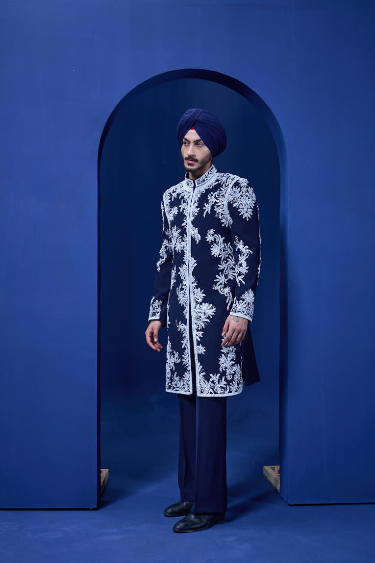 Navy blue Indo Western highlighted with sequins, pearls, cutdana and spring thread work