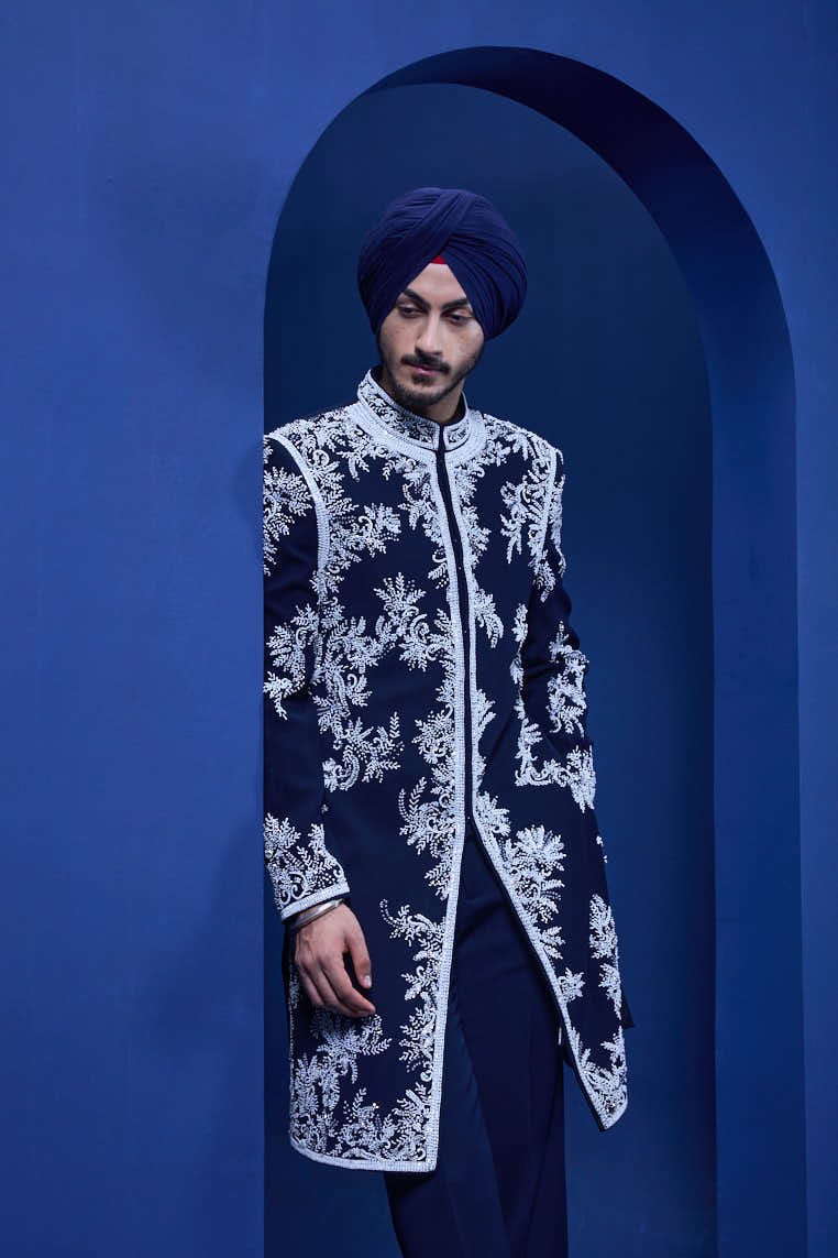 Navy blue Indo Western highlighted with sequins, pearls, cutdana and spring thread work