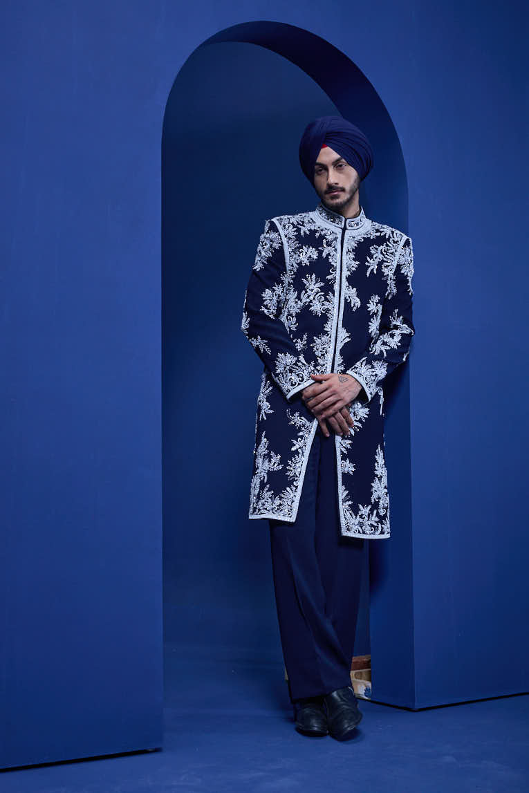 Navy blue Indo Western highlighted with sequins, pearls, cutdana and spring thread work