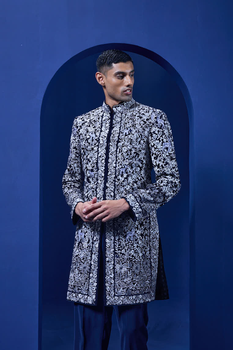 Navy blue Indo Western highlighted with sequins, pearls and thread work