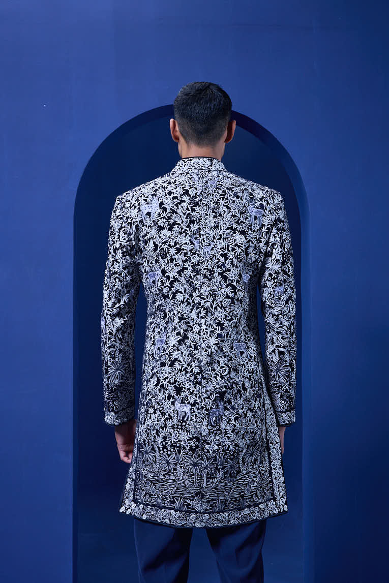 Navy blue Indo Western highlighted with sequins, pearls and thread work