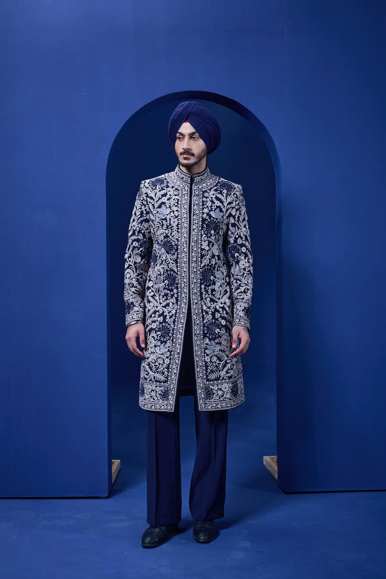 Navy blue Indo Western highlighted with sequins, pearls and thread work