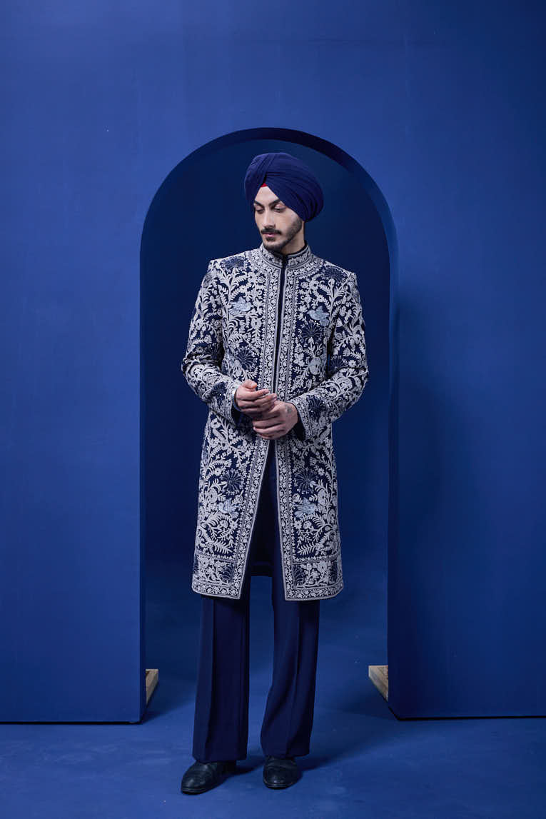 Navy blue Indo Western highlighted with sequins, pearls and thread work
