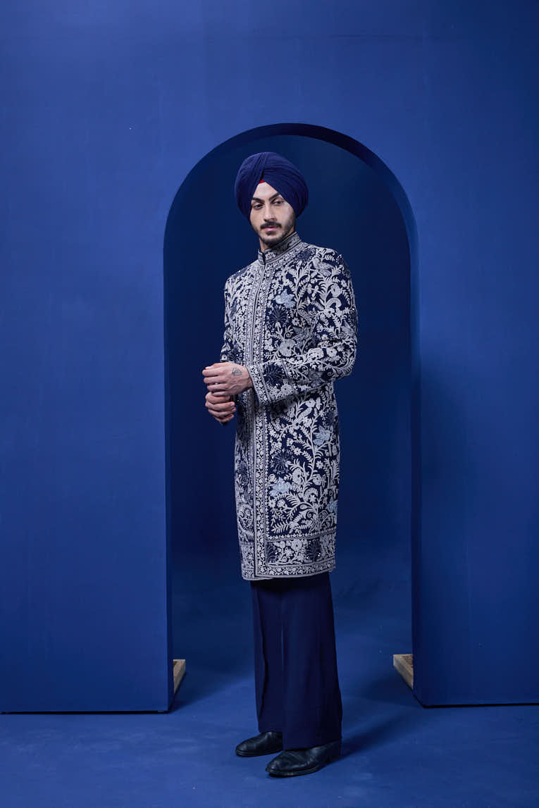 Navy blue Indo Western highlighted with sequins, pearls and thread work