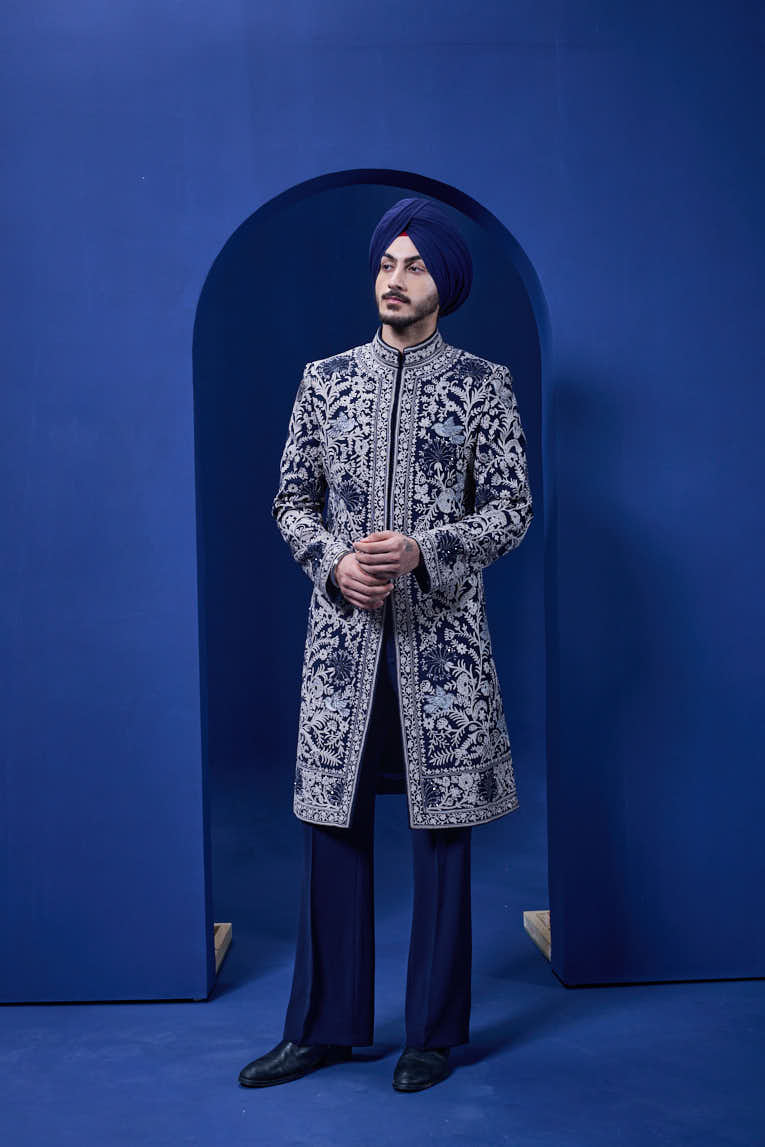 Navy blue Indo Western highlighted with sequins, pearls and thread work