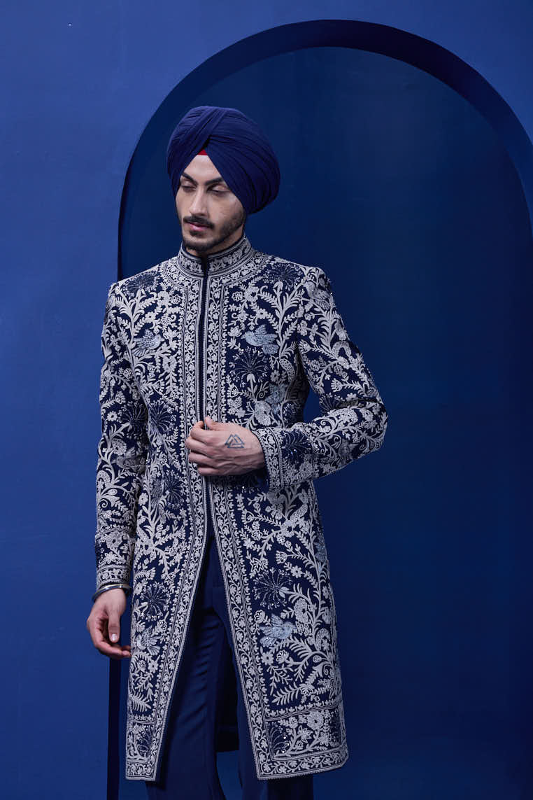 Navy blue Indo Western highlighted with sequins, pearls and thread work
