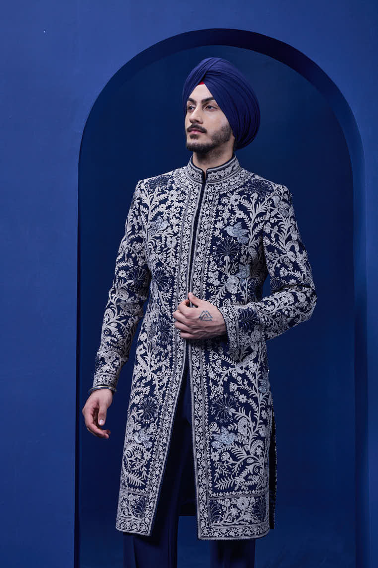 Navy blue Indo Western highlighted with sequins, pearls and thread work