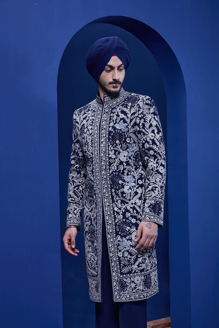 Navy blue Indo Western highlighted with sequins, pearls and thread work
