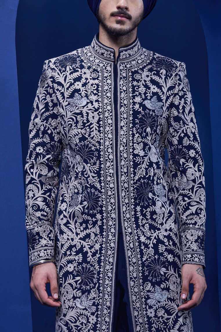 Navy blue Indo Western highlighted with sequins, pearls and thread work