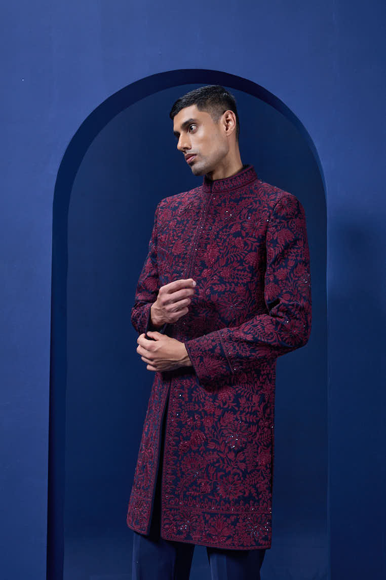 Navy blue Indo Western highlighted with sequins, pearls and wine thread work