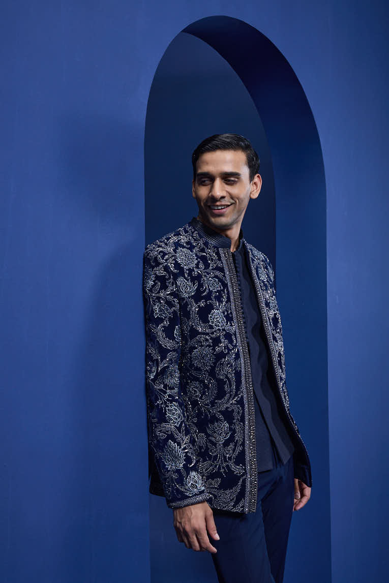 Navy Blue open bandhgala
with silver zari , sequins & pearl
work