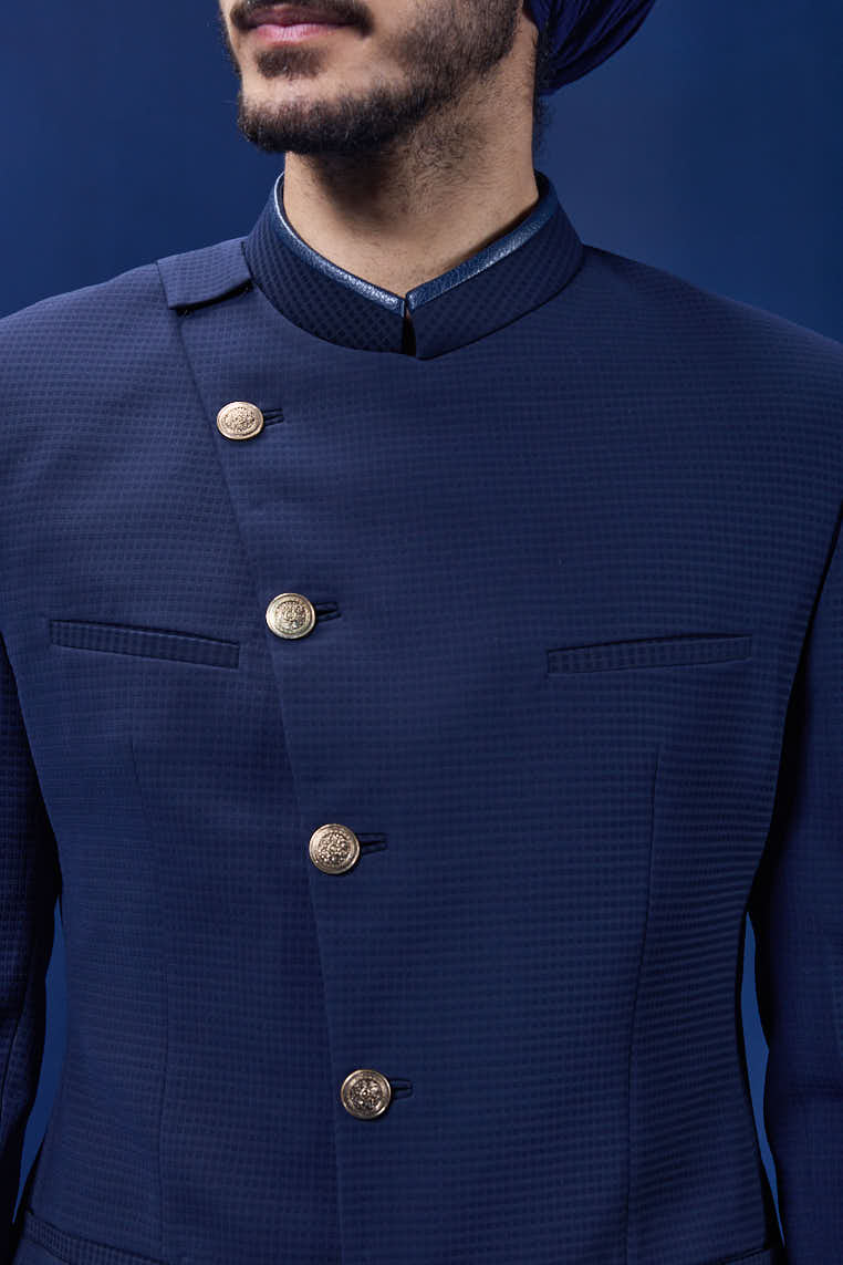 Navy blue bandhgala detailing with golden button satin taping