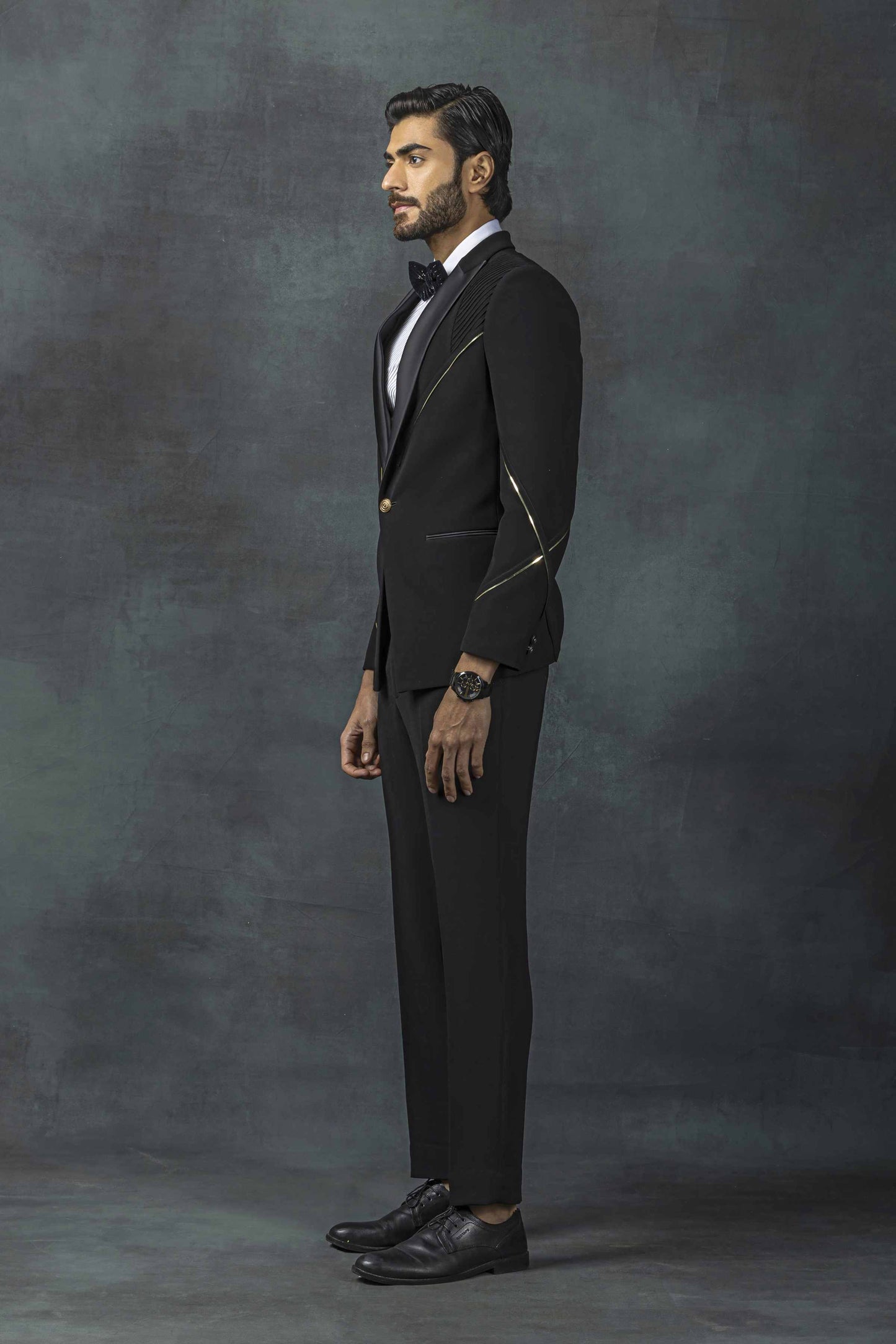 Black Tuxedo With Golden Reel Detailing