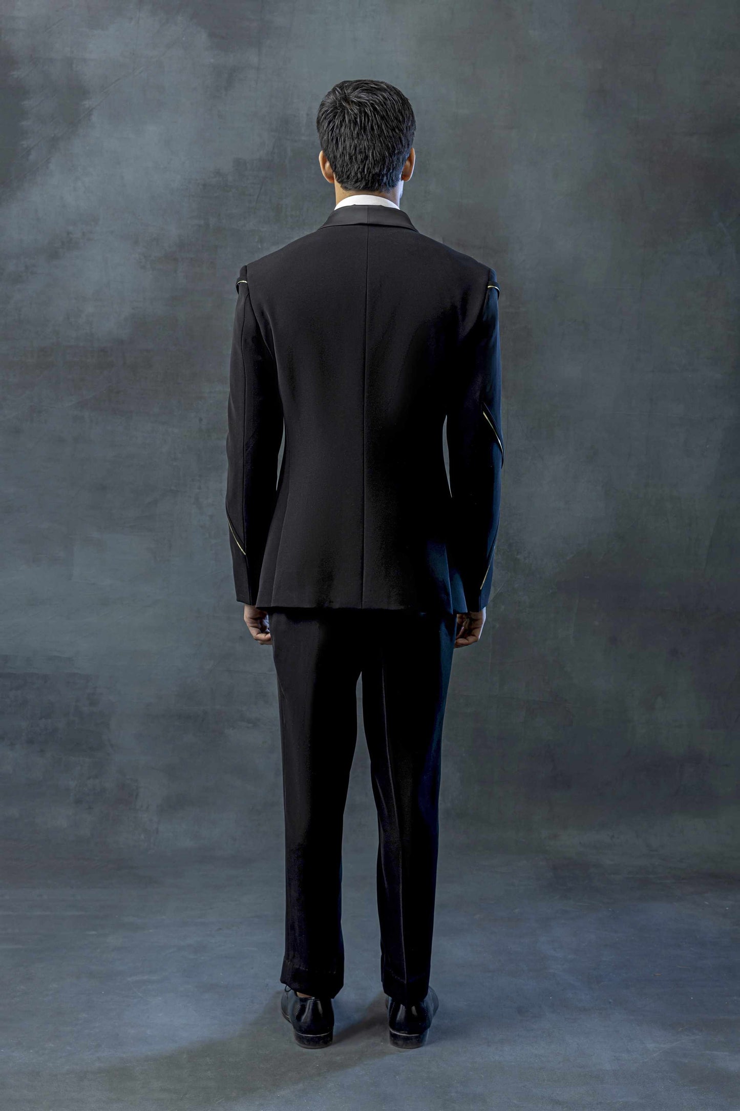 Black Tuxedo With Golden Reel Detailing