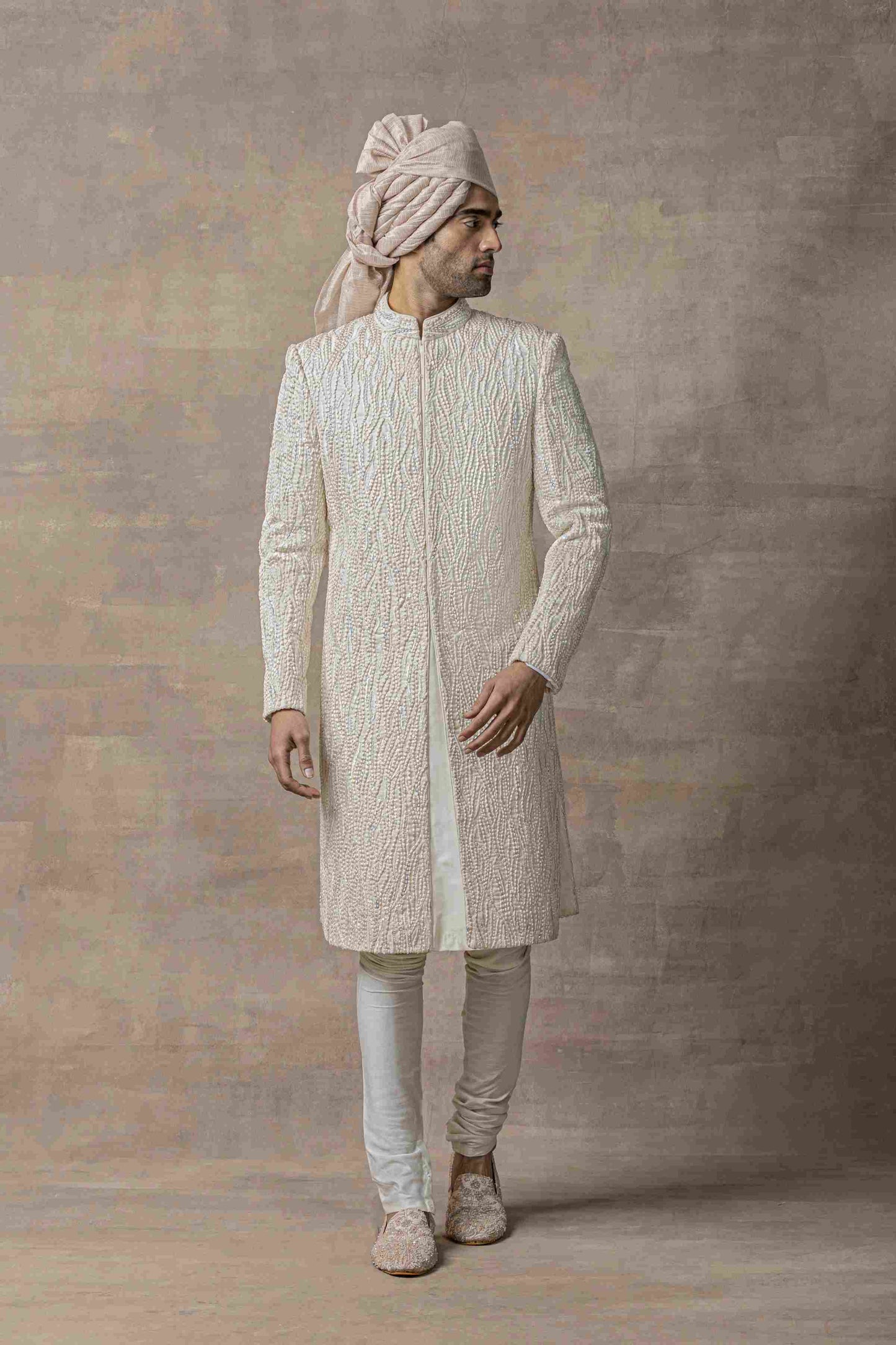 Off White Sherwani Highlighted With Thread Pearl And Multi Coloured Sequin