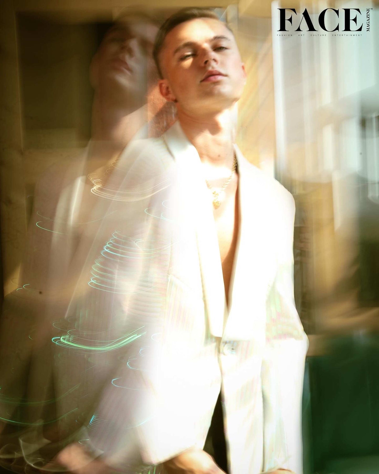 Hrvy In Off White Tuxedo With Rainbow Reel Detailing