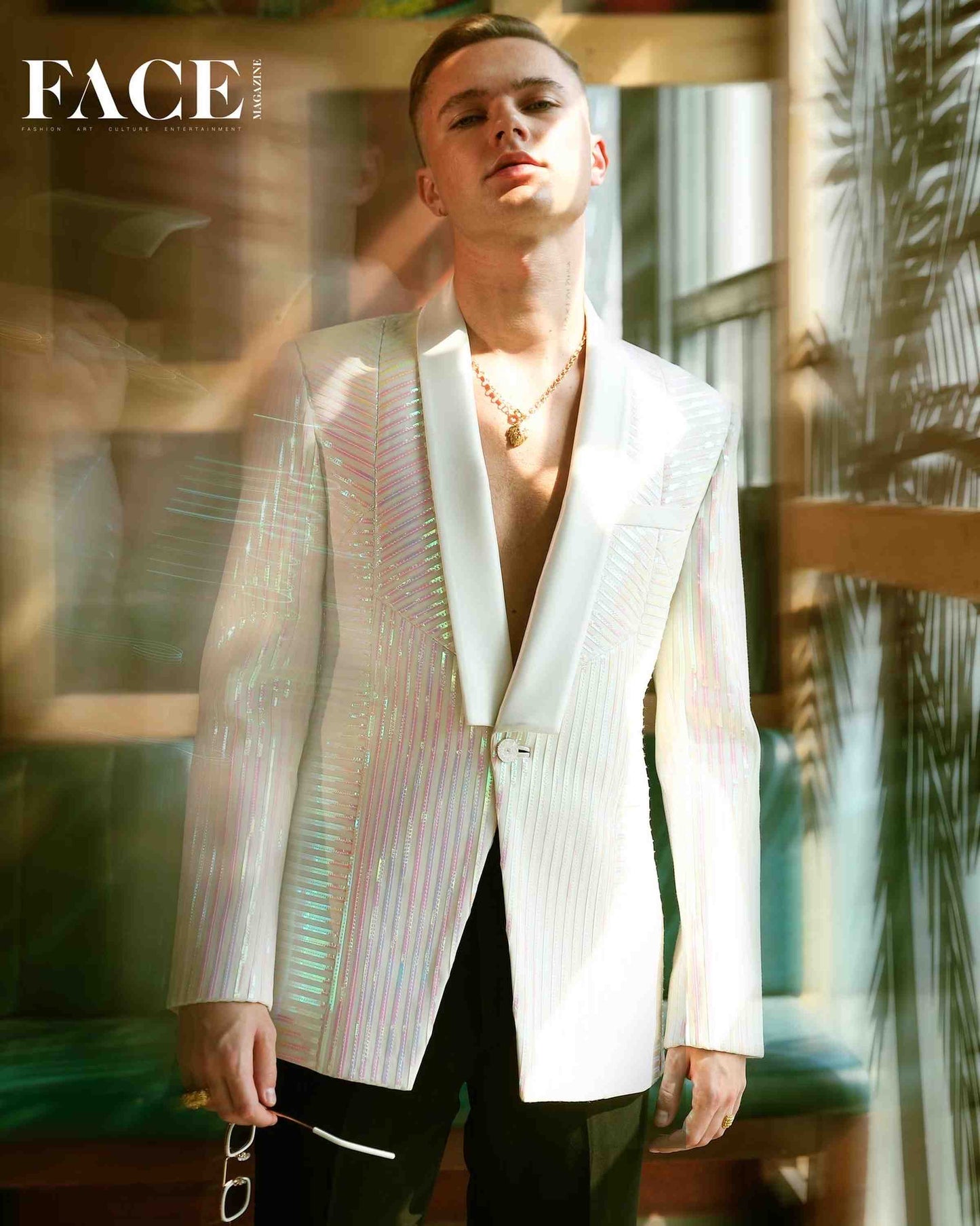 Hrvy In Off White Tuxedo With Rainbow Reel Detailing