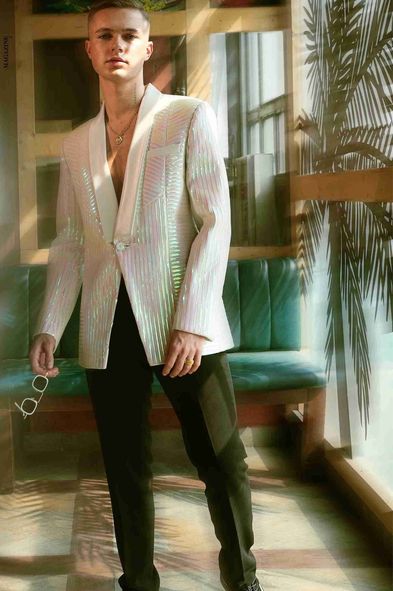 Hrvy In Off White Tuxedo With Rainbow Reel Detailing